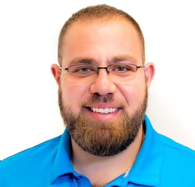Sayran Hagop, Summit Valet Dealer Service Manager, in his blue Summit polo